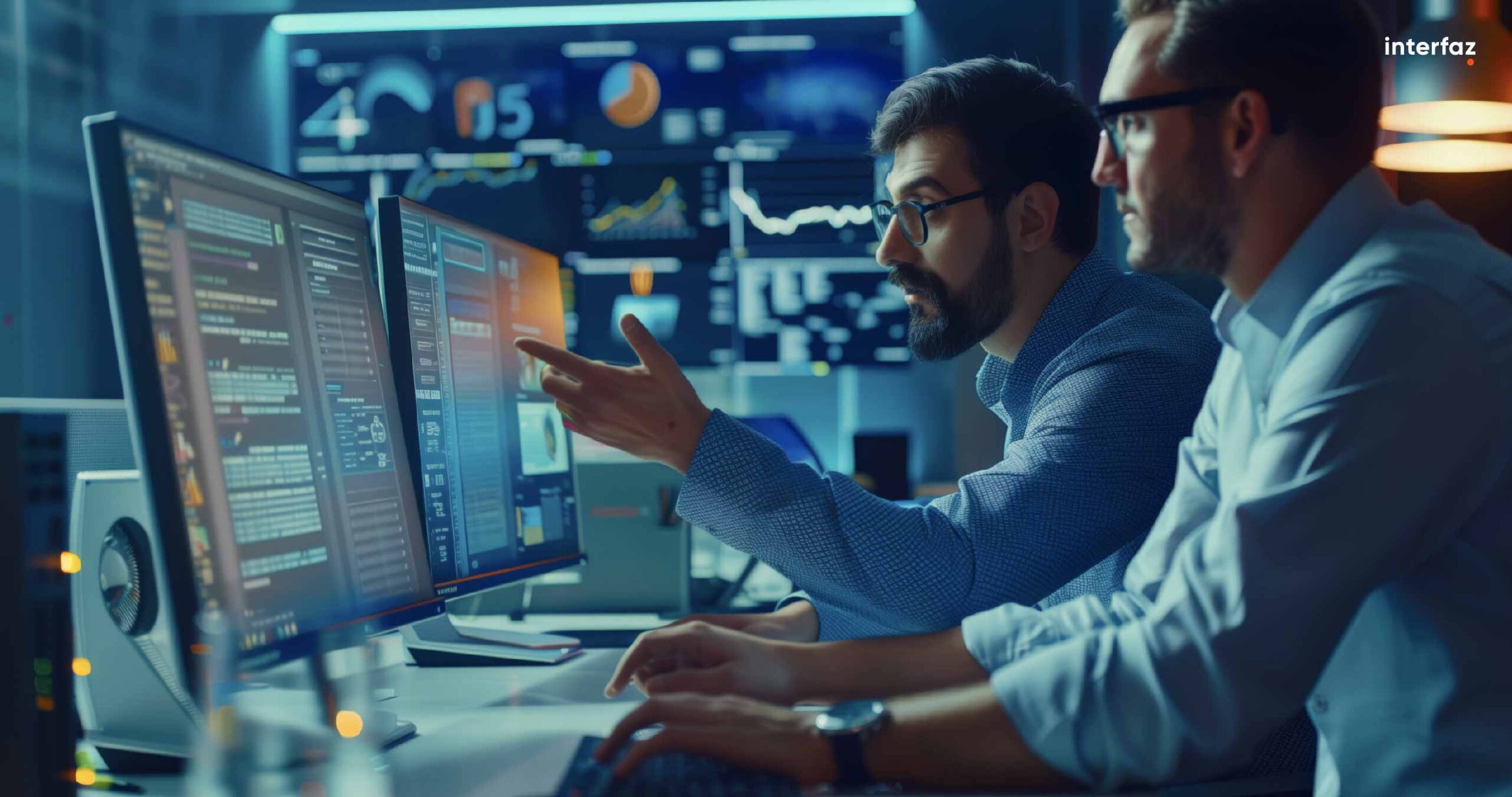 Two male co-workers discussing software solutions in a high-tech office